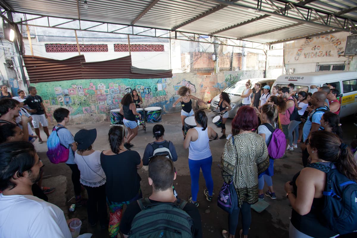 Visitors experiencing authentic community life in Vidigal